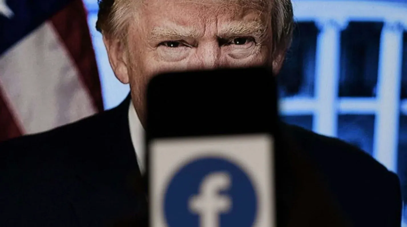 President Trump behind Facebook Logo